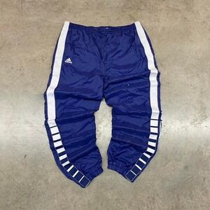 Baggy Navy and white Adidas track pants with adjustable waist and cuffed‎ ankles
